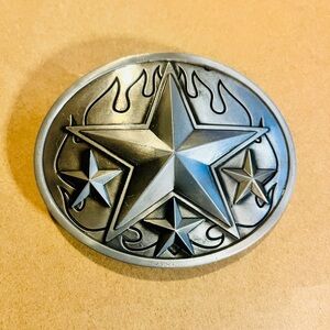 Western-style star belt buckle, often referred to as an "Old West Star. New